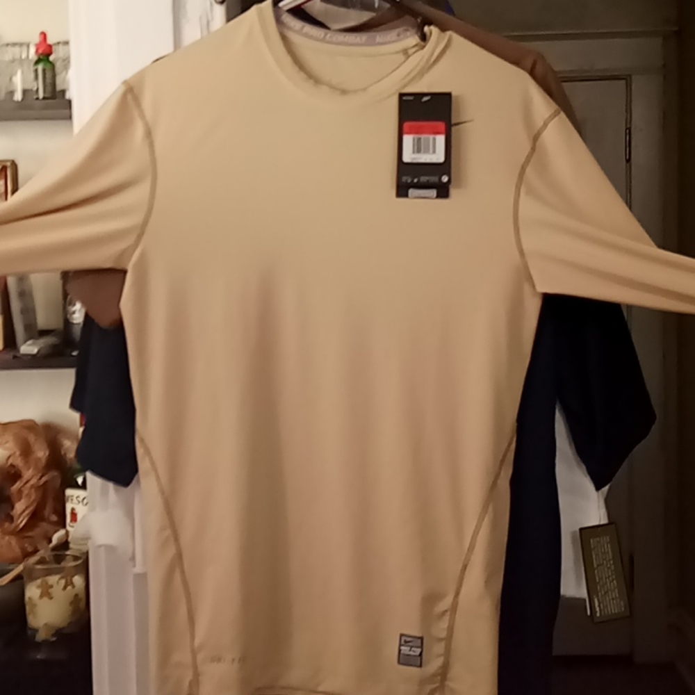 Gold Nike pro combat dry fit